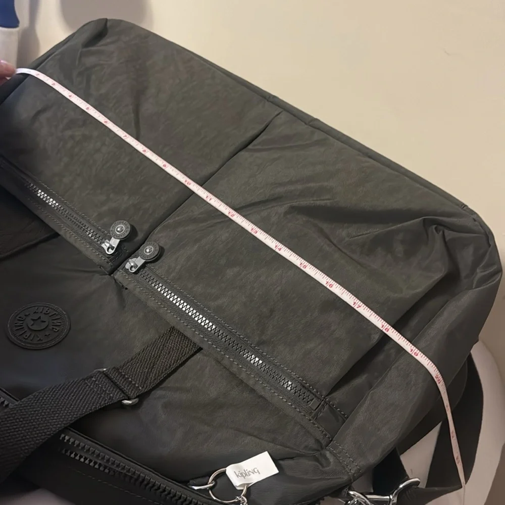 Kipling Black Duffel Bag, new, outside pockets, inside pockets, unisex